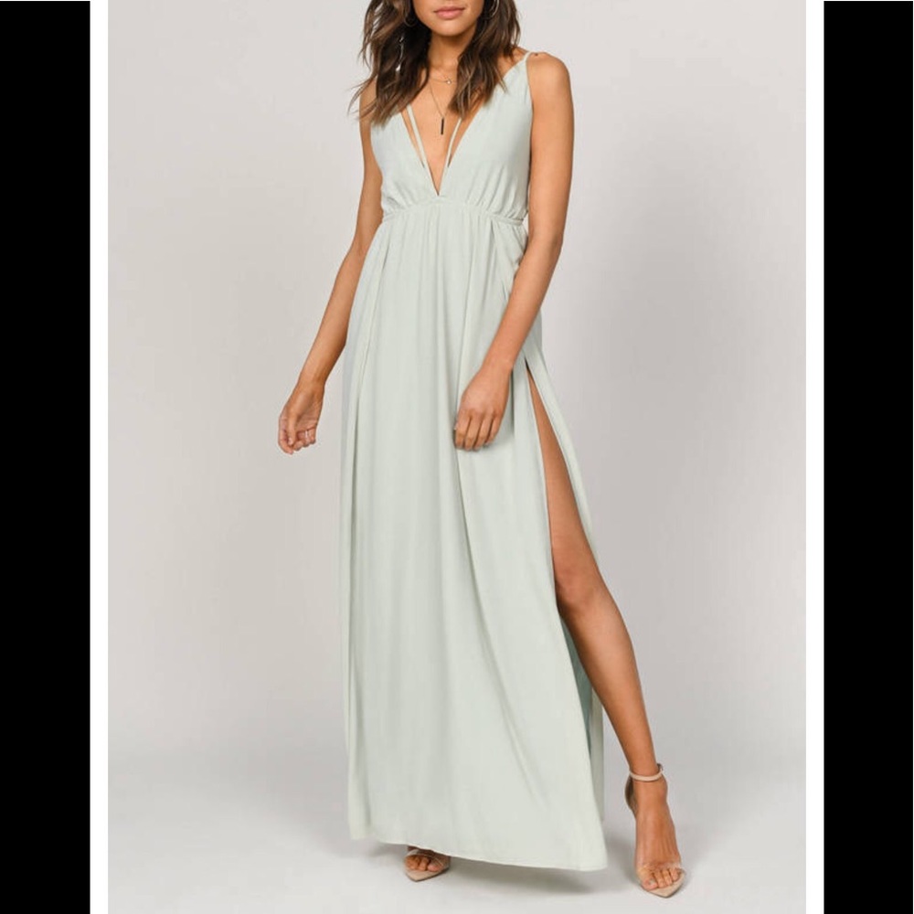 A mint green plunging green maxi dress